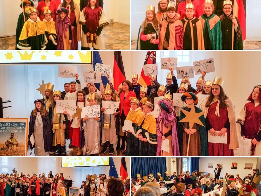 Das Bild zeigt Sternsinger bei Malu Dreyer