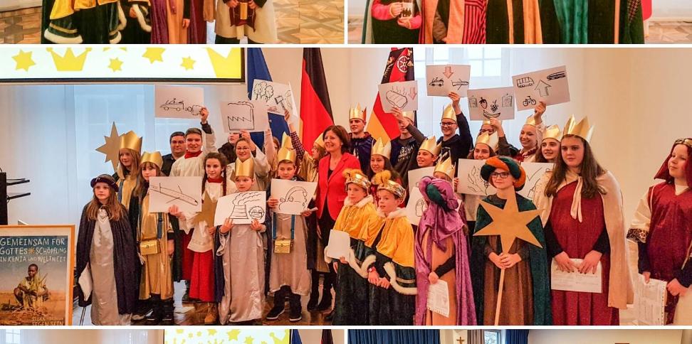 Das Bild zeigt Sternsinger bei Malu Dreyer
